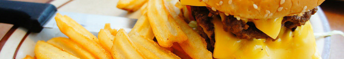 Eating Burger Chicken Wing Cheesesteak at DD PECKERS WING SHACK restaurant in Charlotte, NC.